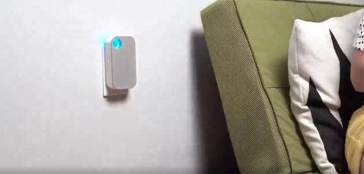 ionpure plugged in next to a couch or bed